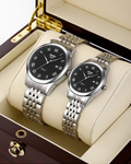 SKMEI Classic Business Couple Quartz Watch – Silver Case Black Dial Steel Band, 30M Waterproof, Calendar Display, Original Quartz Movement – Perfect Gift for Couples