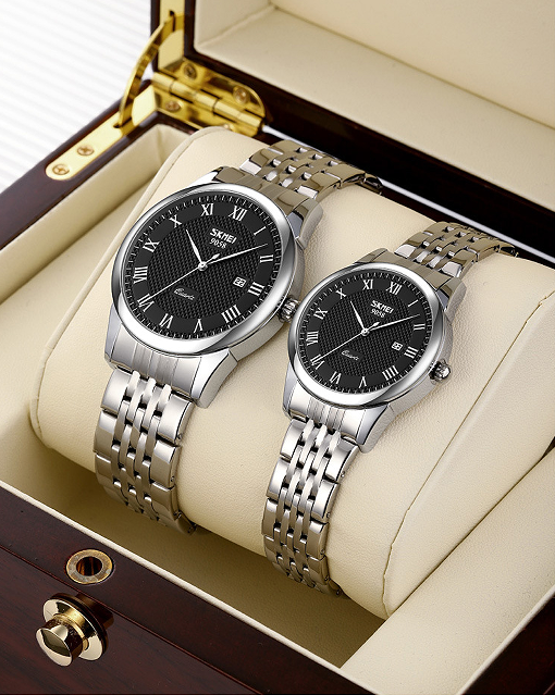 SKMEI Classic Business Couple Quartz Watch – Silver Case Black Dial Steel Band, 30M Waterproof, Calendar Display, Original Quartz Movement – Perfect Gift for Couples